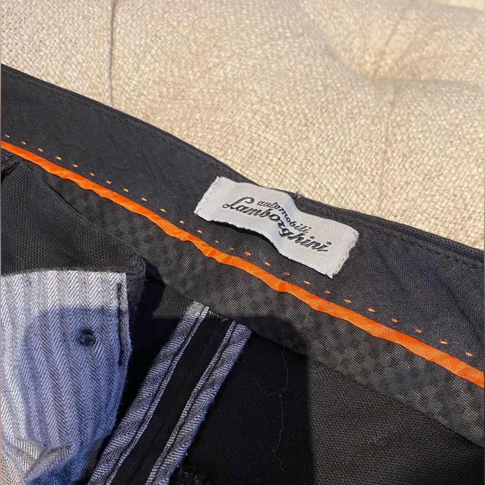 Men’s black cargo Lamborghini pants, size 34, never worn, like new.